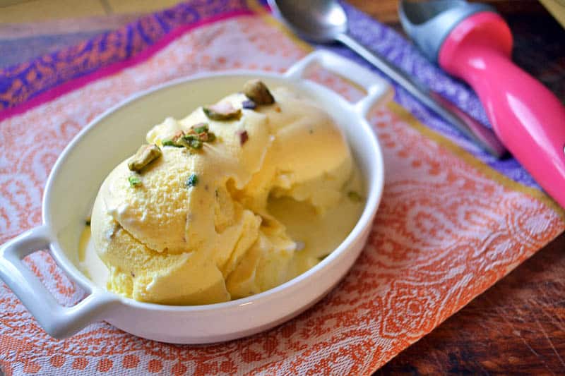 Rose saffron ice cream is fragrant, floral and slightly sweet. This Persian ice cream is full of aromatic flavors and finished with chopped pistachios.