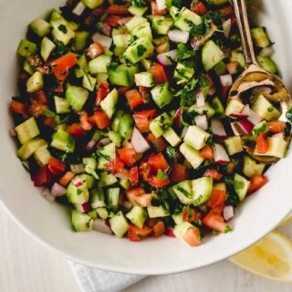 The perfect accompaniment to any Mediterranean dish, Israeli chopped salad is simple and fresh with tomatoes, cucumbers, fresh herbs and bright lemon.