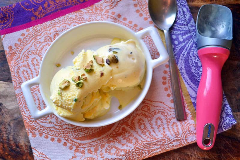Rose saffron ice cream is fragrant, floral and slightly sweet. This Persian ice cream is full of aromatic flavors and finished with chopped pistachios.