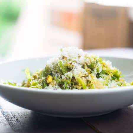 Brussels Sprout Salad with Pistachios and Pecorino makes for an elegant holiday side dish. The lemon Dijon vinaigrette gently wilts the sprouts and a coating of salty Pecorino cheese is added, rounding out all of the delicious savory flavors.