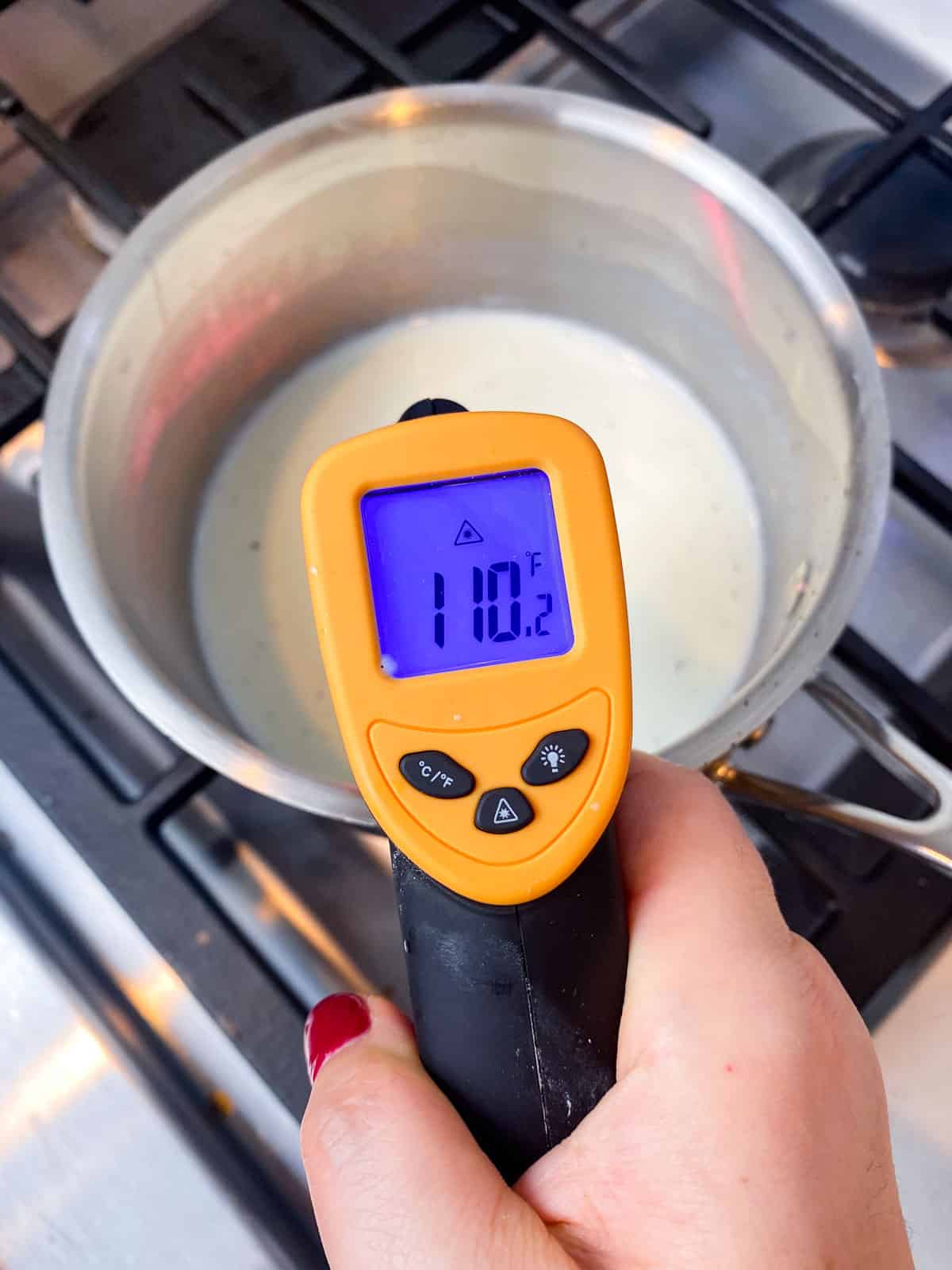 Heat milk to 110 degrees Fahrenheit.