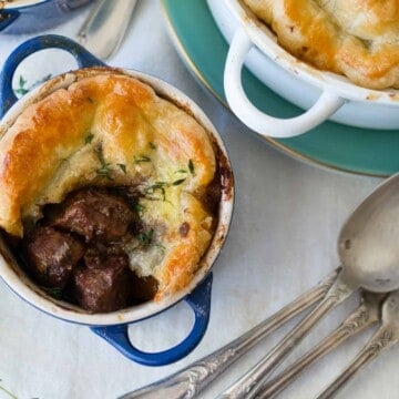 Beef Bourguignon pot pie filled with sauteed mushrooms and onions and topped with a flaky (and easy) puff pastry crust.