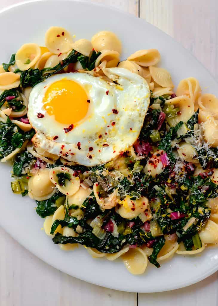 A simple chard pasta recipe, Orecchiette with Swiss Chard, Parmesan and fresh Lemon is light and quick to make for a weeknight dinner.