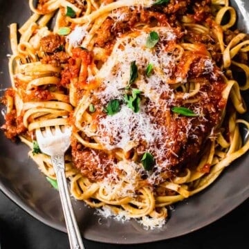 Traditional bolognese sauce is a labor of love. Made low and slow with layers of ground beef and pork, carrots and celery and a splash of milk for creaminess.