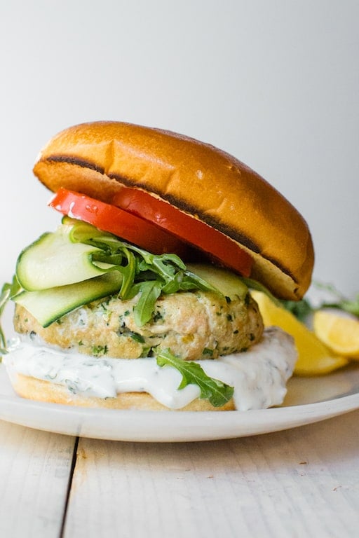 Mediterranean salmon burgers made with wild caught salmon with bright flavors salty preserved lemon, loads of fresh herbs and warm spices.