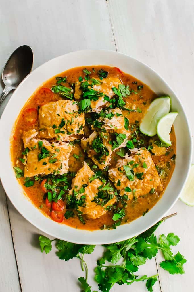 A simple salmon curry with with strong Thai flavors of ginger, galangal and lemongrass. Serve with basmati rice for a flavorful and quick weeknight dinner.