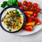 This easy and creamy tahini sauce is mixed with garlic, fresh lemon juice and spices that is the perfect addition to drizzle over grilled meats and vegetables.