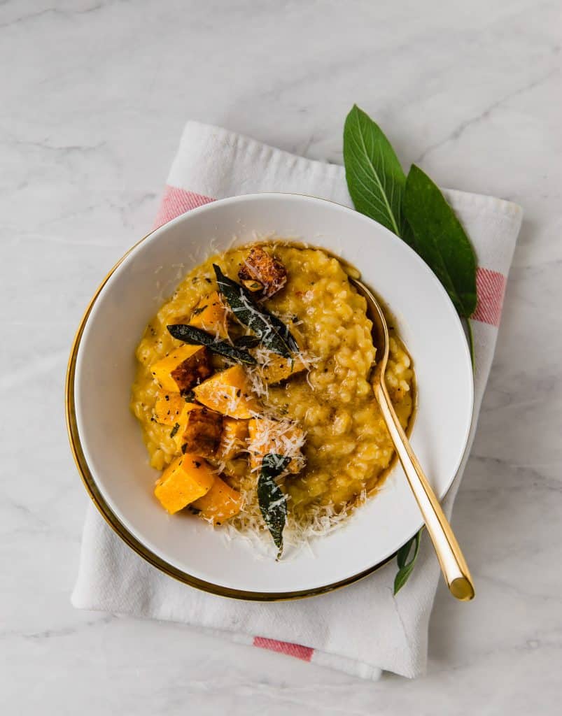 The epitome of fall comfort food, done in half the time as traditional risotto. Butternut squash risotto flavored with floral saffron and topped with brown butter, crispy sage and a good grating of Parmesan. 