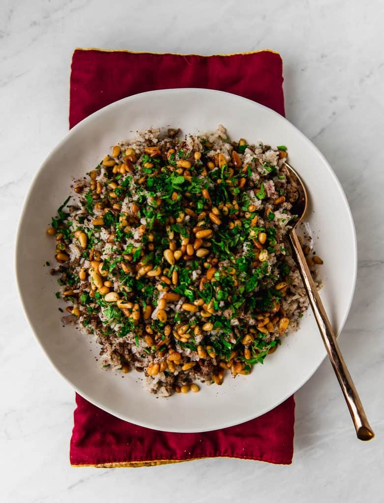 A decadent and impressive spiced rice dish that literally translates to "stuffing". Layered with warm spices of cinnamon and allspice, savory ground beef and toasted pine nuts. 