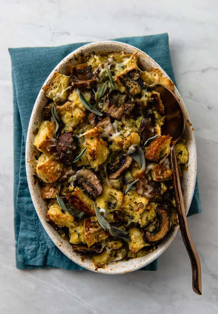 A modern spin on traditional stuffing, this savory bread pudding is filled with bold flavors of sauteed leeks, herb sauteed mushrooms and a good amount of nutty and savory Gruyere. 