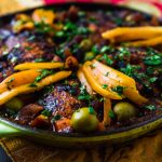 A flavorful weeknight chicken tagine recipe made in nearly 30 minutes. With just a handful of bold spices, salty preserved lemons and buttery olives.