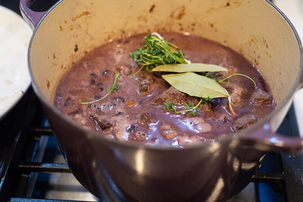 A slightly more simplified version of Julia Child's beef bourguignon recipe, with a rich red wine sauce and buttery herbed mushrooms. 