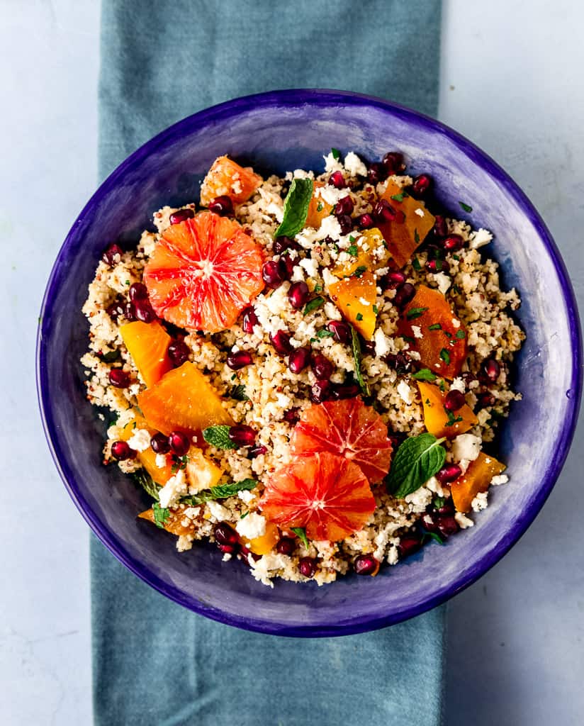 A colorful winter quinoa salad with roasted yellow beets, tangy blood orange, salty feta cheese and sweet pomegranate seeds all dressed with a simple blood orange vinaigrette.