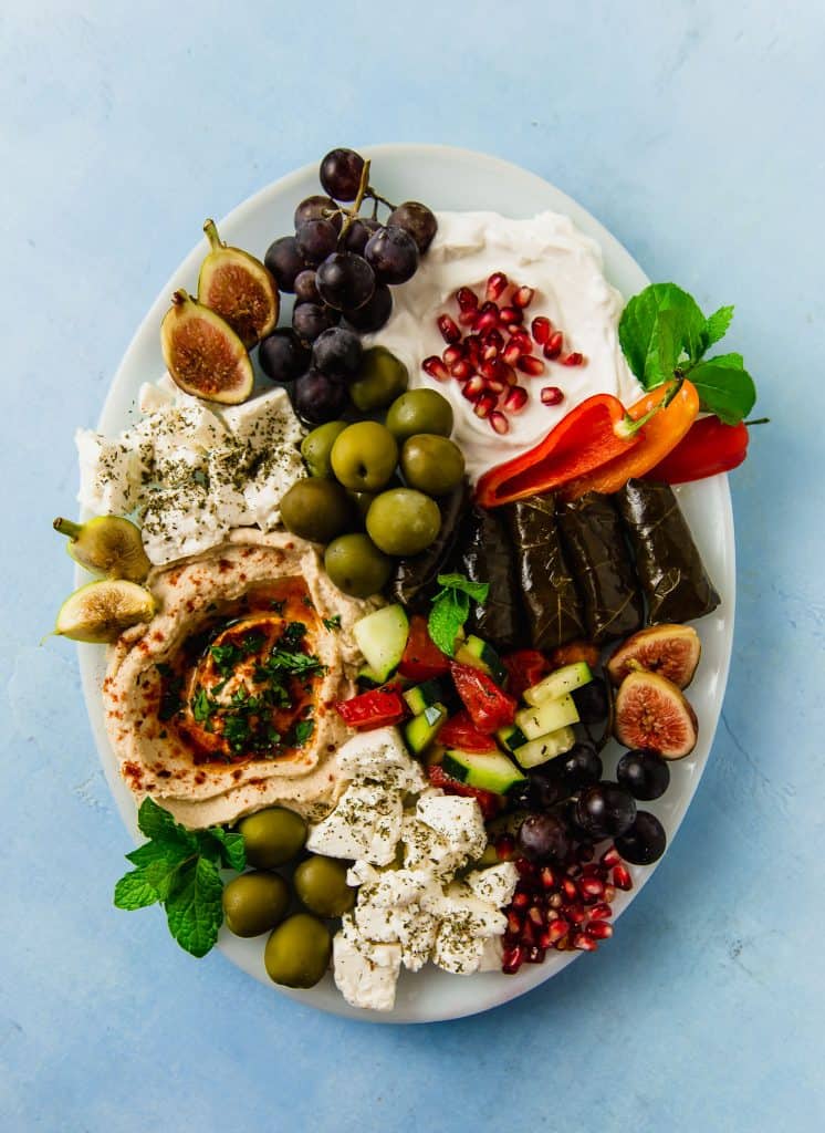 Learn to make a colorful and flavorful vegetarian mezze platter with all the Mediterranean favorites, including stuffed grape leaves, hummus and fresh fruit and vegetables. 