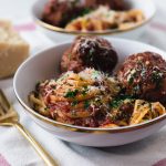 Homemade meatballs with Sunday gravy is a true labor of love. Meatballs are mixed with three meats and seasoned with flavorful aromatics which are then simmered in marinara for hours making them incredibly tender and flavorful.