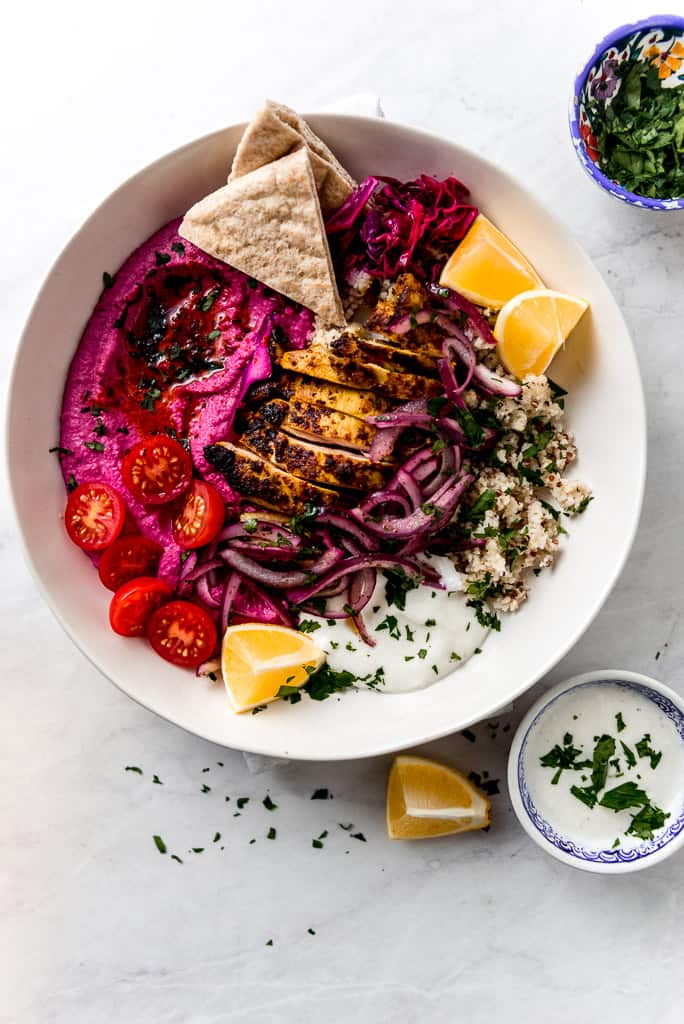 Middle Eastern chicken shawarma recipe will be your favorite way to cook chicken. Serve chicken shawarma bowls with quinoa, hummus and creamy tahini.