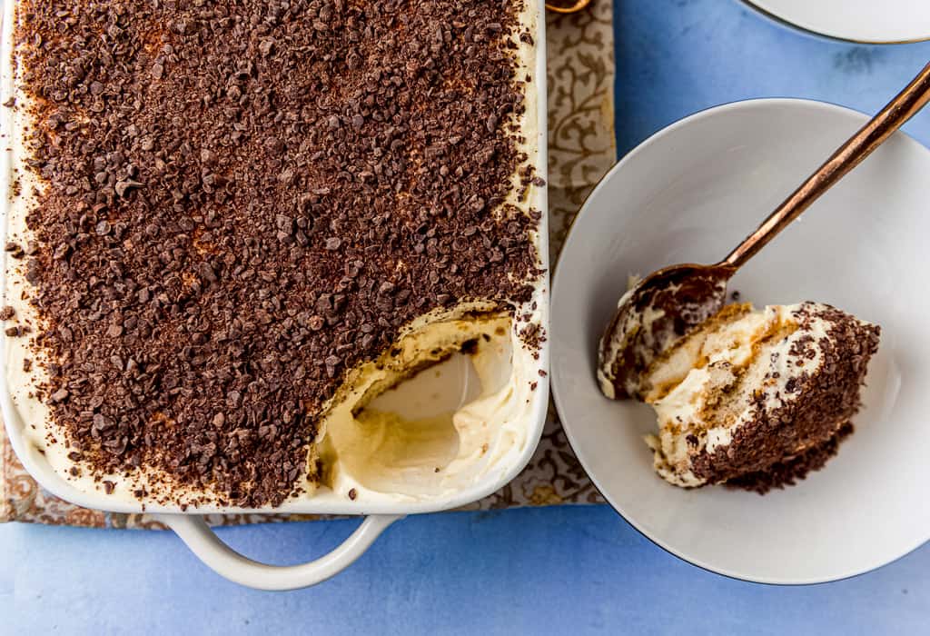 Classic tiramisu recipe layered with flavors of espresso and amaretto for an extra pop of flavor. Creamy, decadent and slightly nutty from the almond liquor, this is a recipe everyone should have in their repertoire.