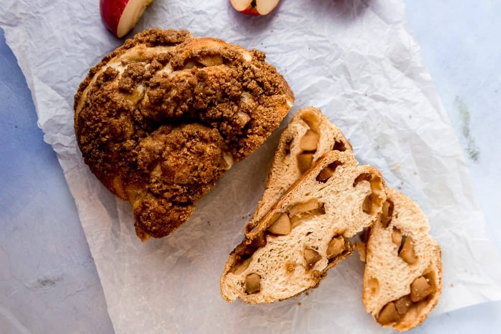 Apple pie meets challah in this apple stuffed challah! And once braided, the round challah is generously sprinkled with a brown sugar streusel topping. 