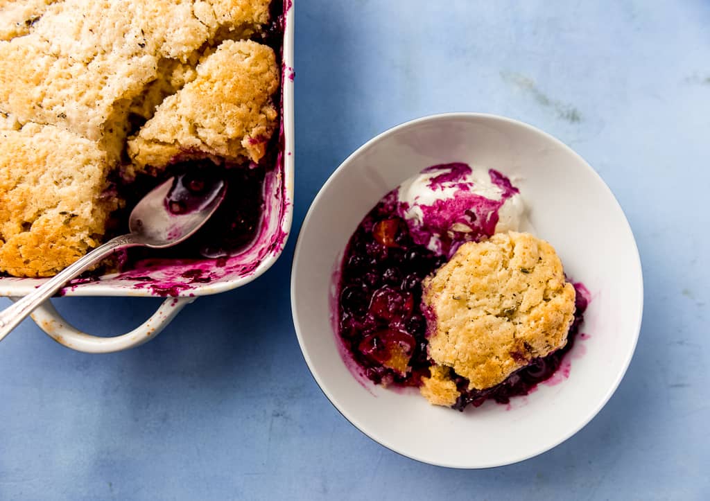 A classic recipe for blueberry peach cobbler with just enough floral lavender to make the sweet dessert pop. This is what summer desserts are made for!