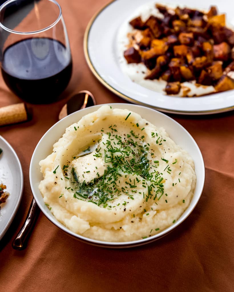 Creme fraiche mashed potatoes are mixed with sweet roasted garlic and finished with fresh chives and maybe an extra dab of butter too. 