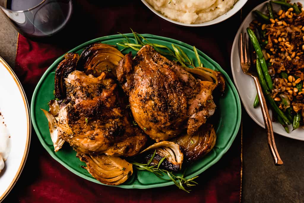 Easy roasted turkey thighs are seasoned with rosemary and tarragon and roasted with fennel until caramelized.