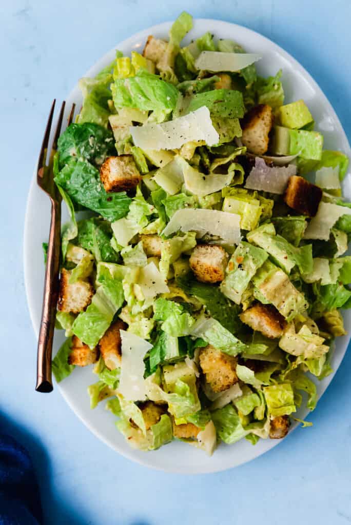 There is nothing better than a classic, homemade caesar salad dressing. This caesar dressing is thickened with an egg yolk, anchovies and freshly grated Parmesan cheese (no mayo here!) And has the perfect balance of creamy, savory, cheesy and spicy.