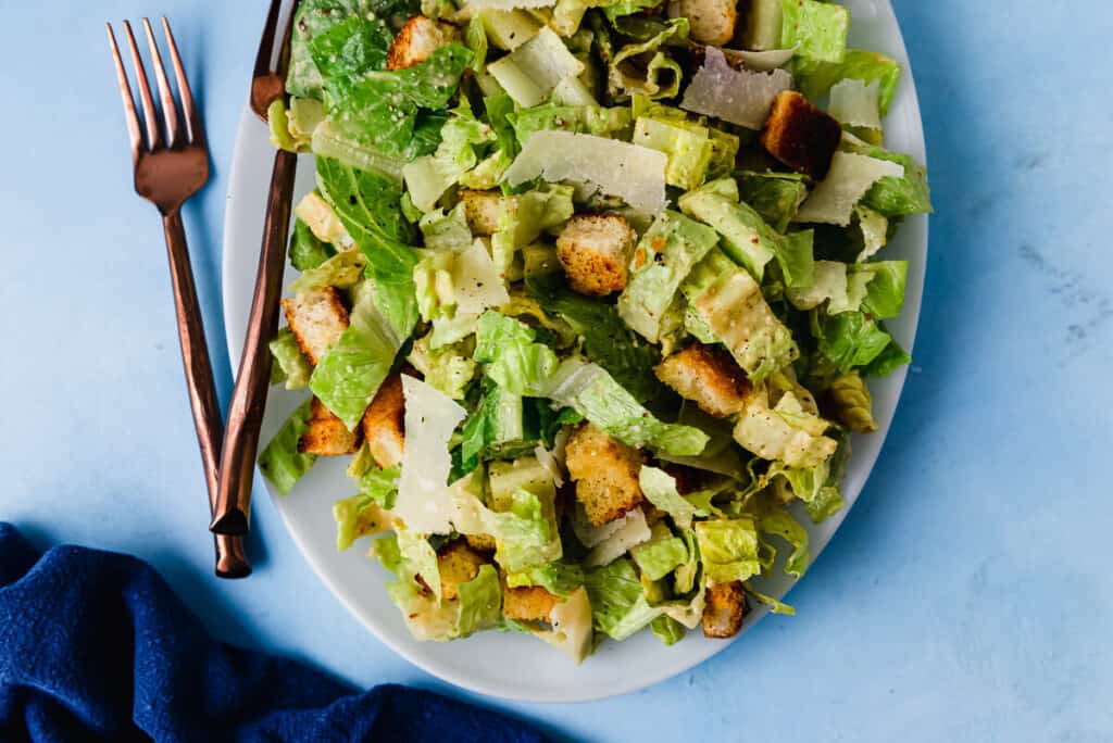 There is nothing better than a classic, homemade caesar salad dressing. This caesar dressing is thickened with an egg yolk, anchovies and freshly grated Parmesan cheese (no mayo here!) And has the perfect balance of creamy, savory, cheesy and spicy.