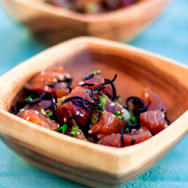 Shoyu poke is a popular poke style that you'll find all over the Hawaiian islands. This version is ahi shoyu poke with cubed ahi (tuna) that's seasoned with shoyu (soy sauce), sesame oil and sliced sweet onions.