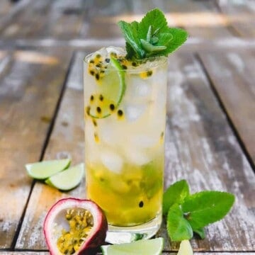 This passion fruit mojito is a muddled with classic flavors of mint and lime and finished with fragrant passion fruit pulp and garnished with more fresh mint.