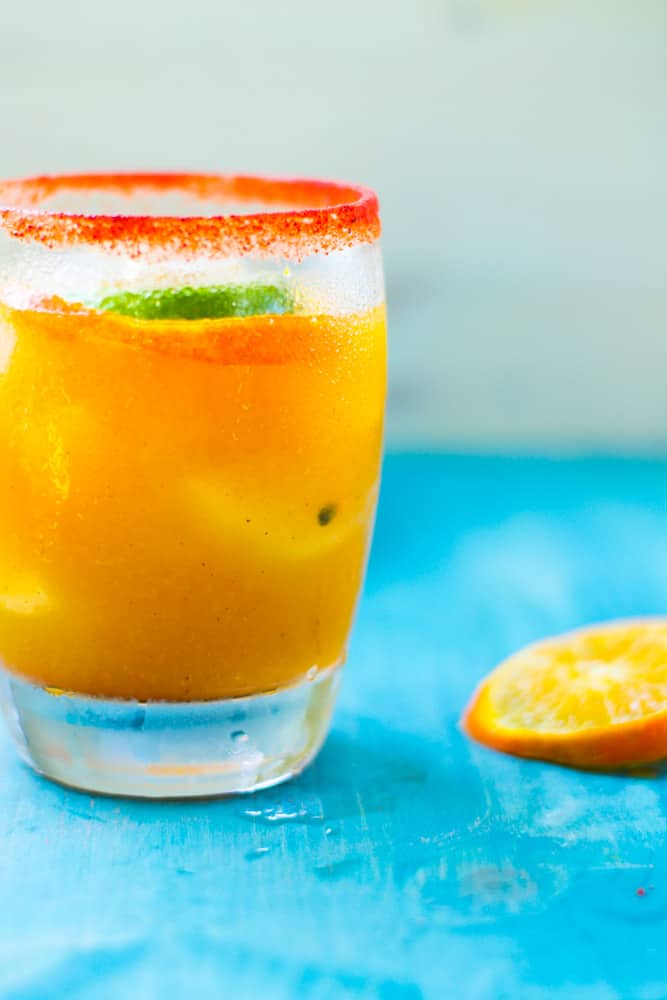 Passion fruit margarita is a true sip of the tropics! Inspired from the flavors of Hawaii, tropical passion fruit juice is shaken with the classic flavors of a margarita. And the best part is the sweet and tart li hing mui rim.