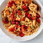 Halloumi pasta is comfort food at it's finest! Cubes of halloumi cheese are lightly fried to golden brown and tossed with cherry tomato pasta.