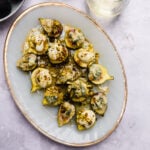 Baked figs with honey and pistachios is an easy and impressive appetizer. The baked figs are topped with blue cheese, pistachios and drizzled with honey.