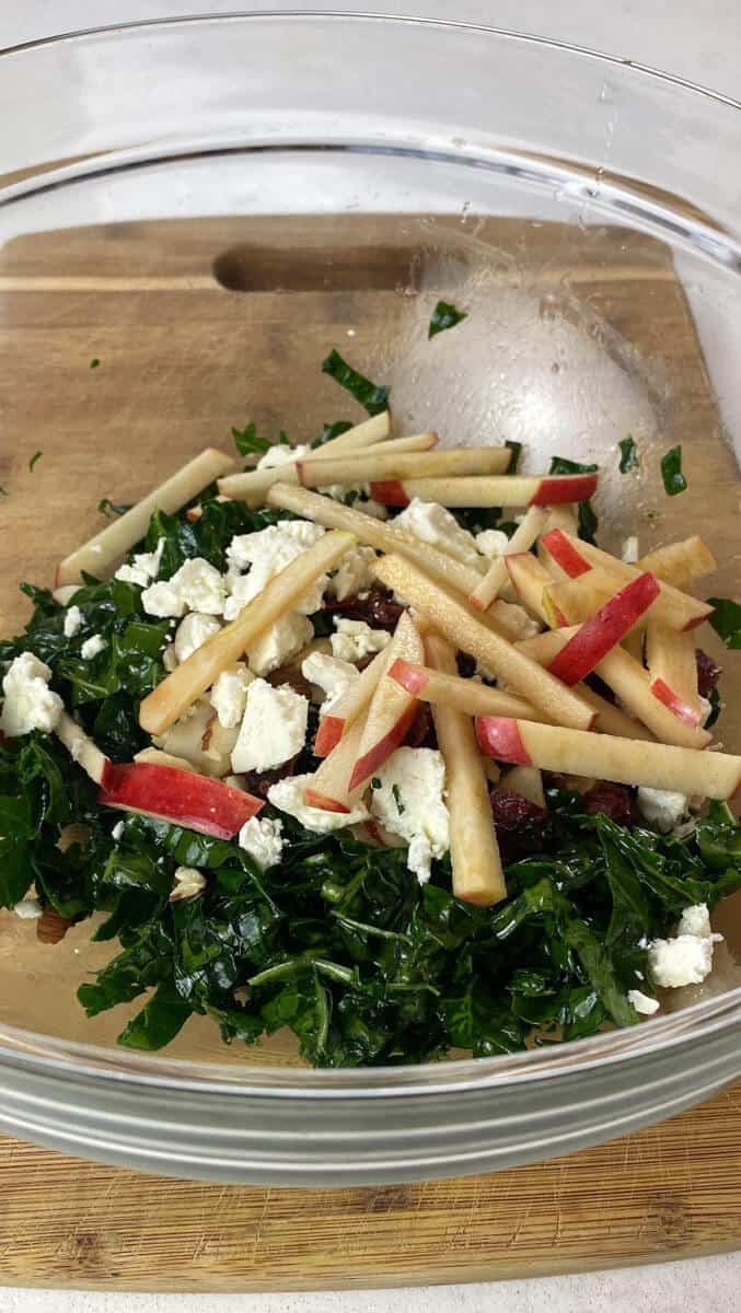 To the kale and feta salad, add sliced apples.