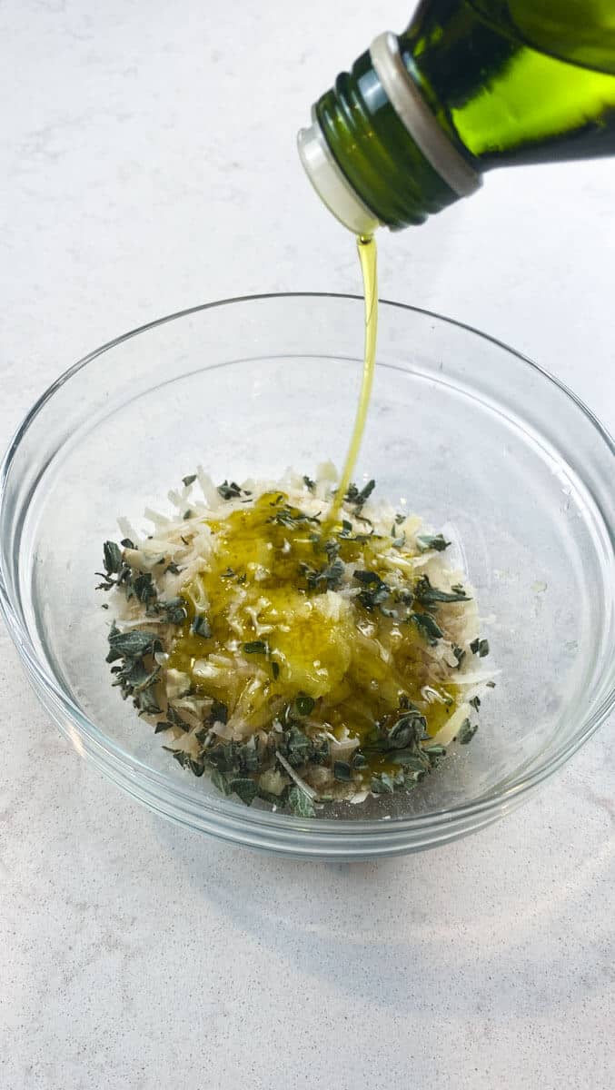 Drizzle olive oil onto the panko breadcrumb and parmesan mixture to moisten before adding to delicata squash.