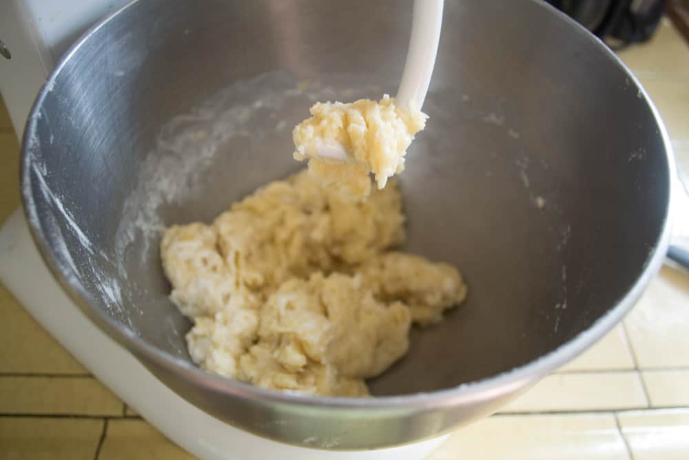 Mix the knish dough until dough forms and ingredients are well incorporated.