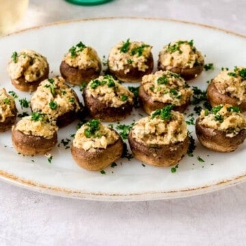 Button mushrooms stuffed with boursin cheese make an elegant appetizer.