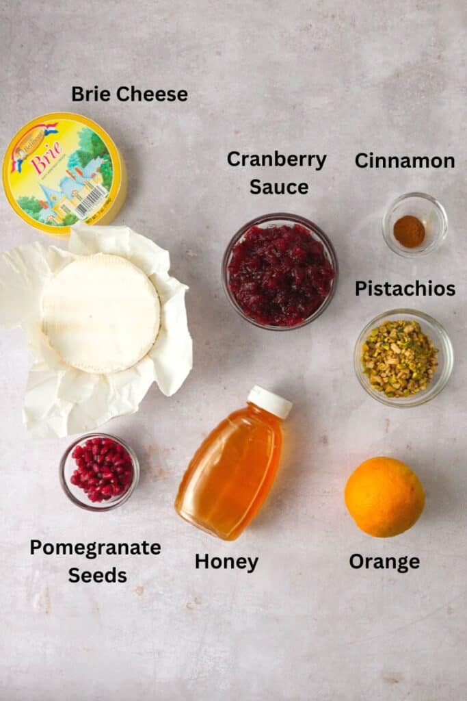 Ingredients to make cranberry baked brie.