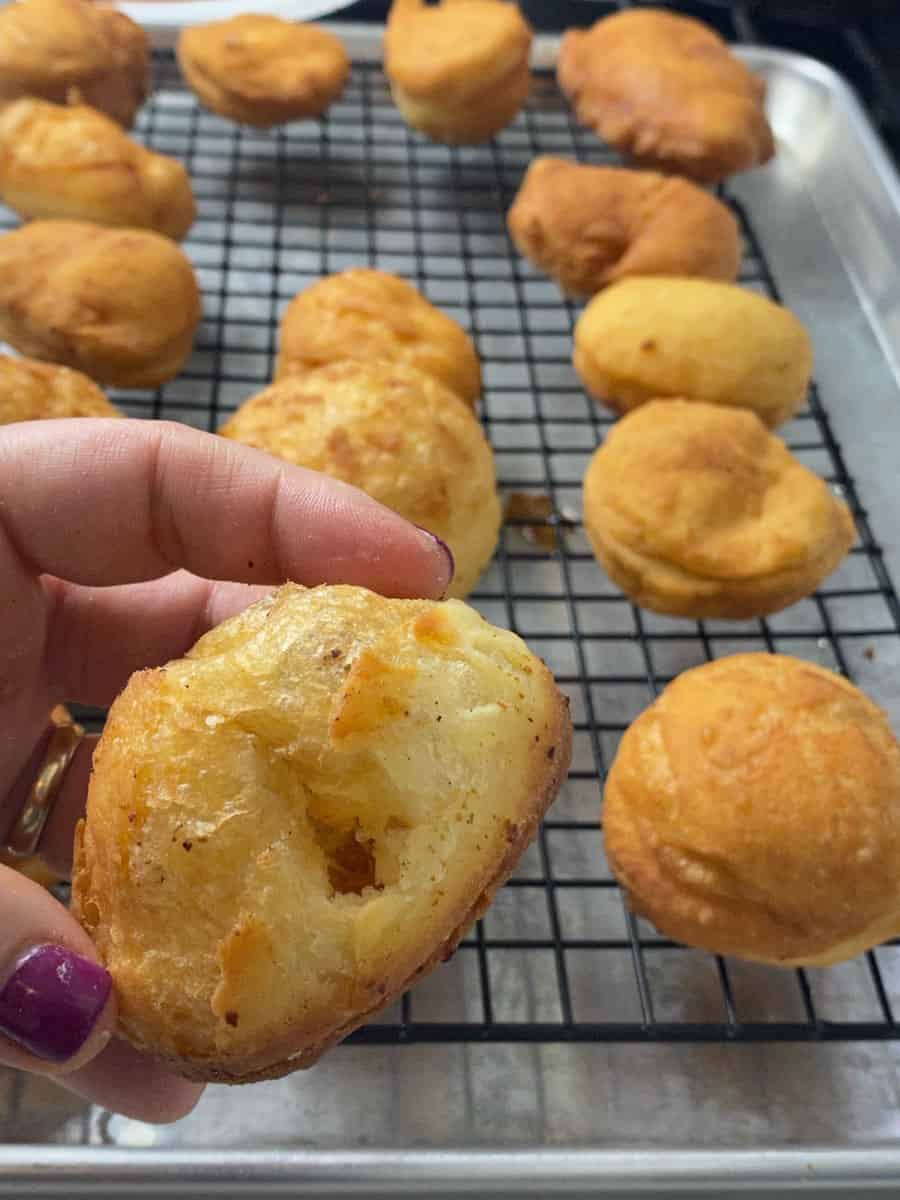 Make a small hole in the donut to pipe in the pear mixture.