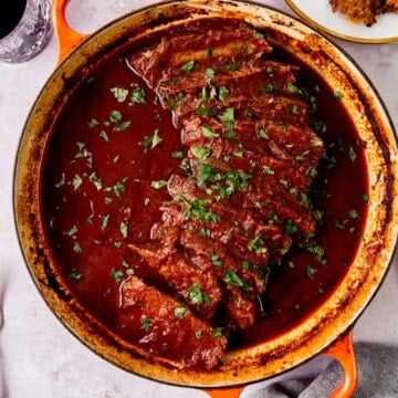 Braised beef brisket in a rich sweet and sour tomato sauce.