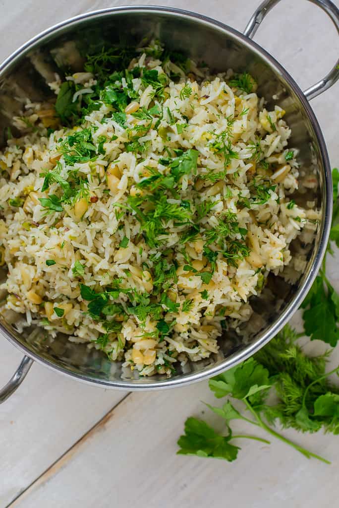 Greek rice pilaf with orzo and dill, fresh lemon and more fresh herbs.
