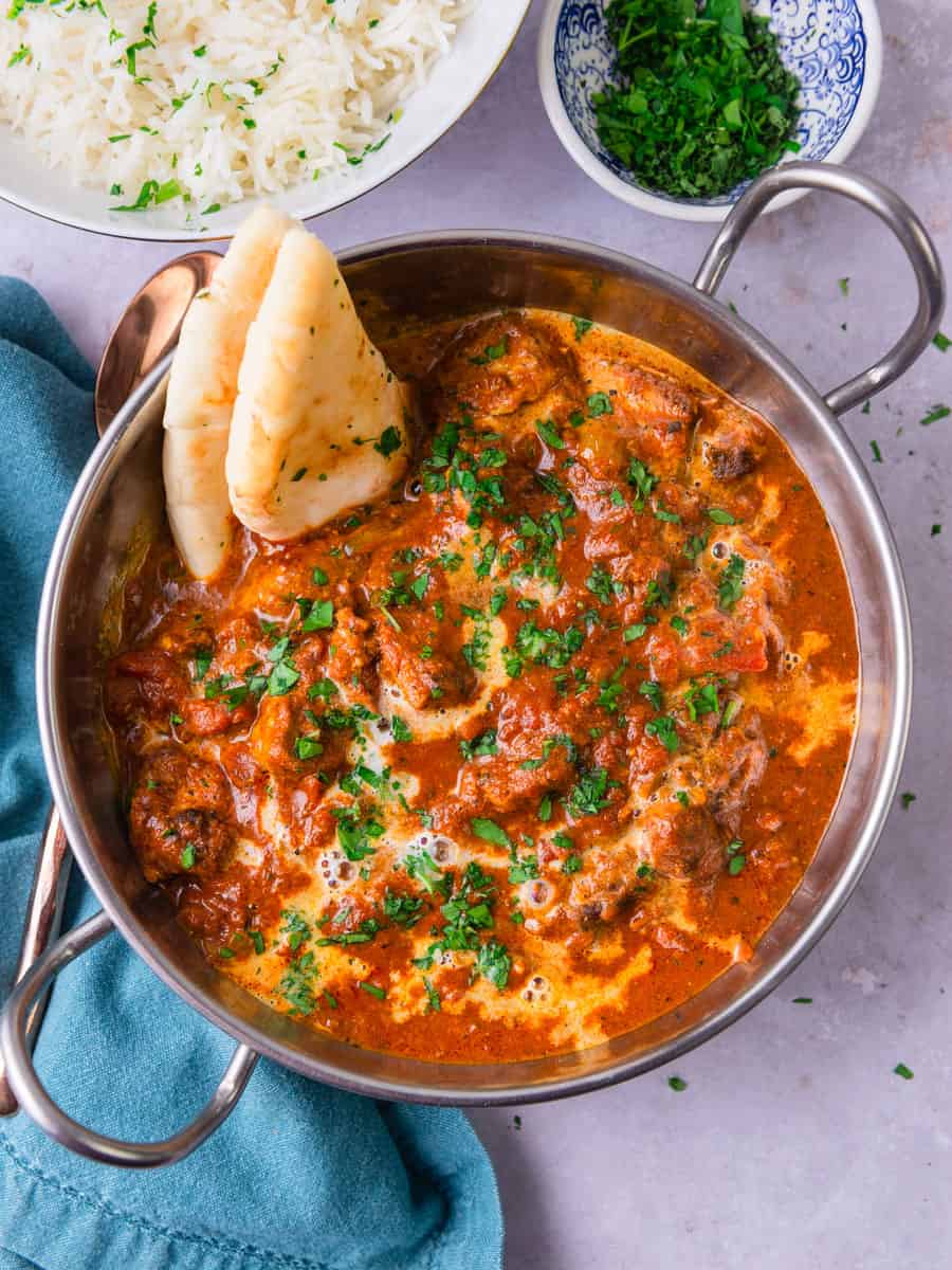 Garnish this easy chicken tikka masala recipe with a drizzle of coconut milk and chopped herbs. Serve with naan and basmati rice.