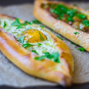 Turkish pide with two different fillings of cheese and another one with ground beef.