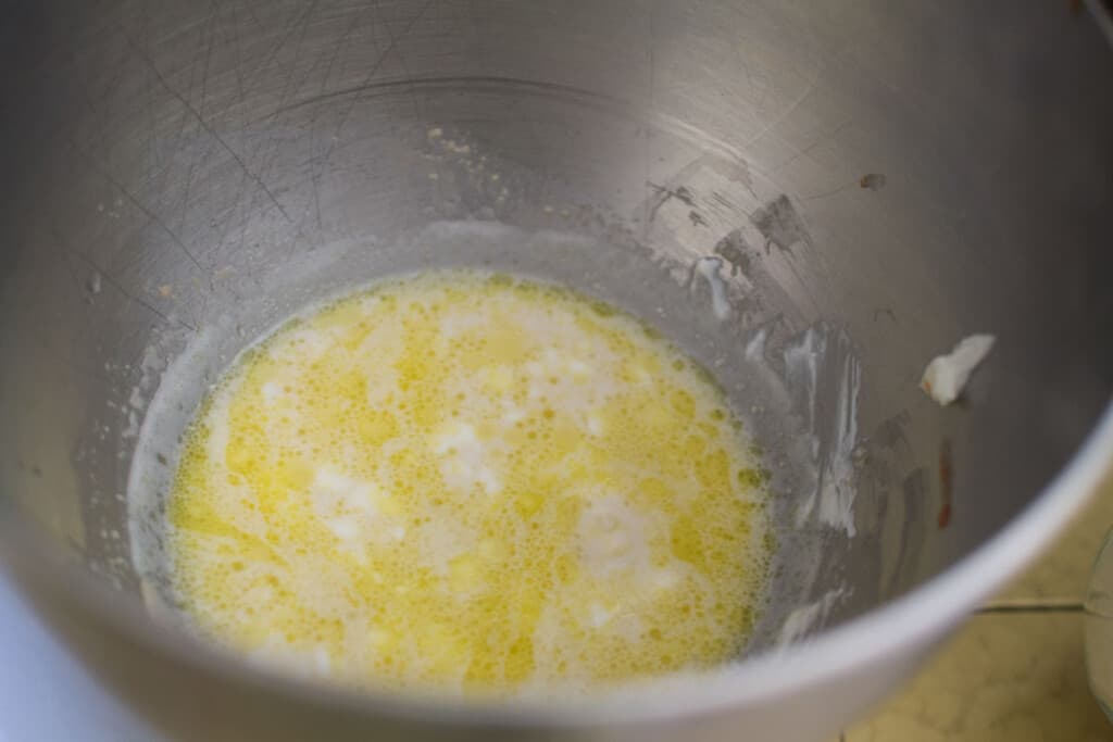 Add the egg and yogurt mixture to the yeast mixture.
