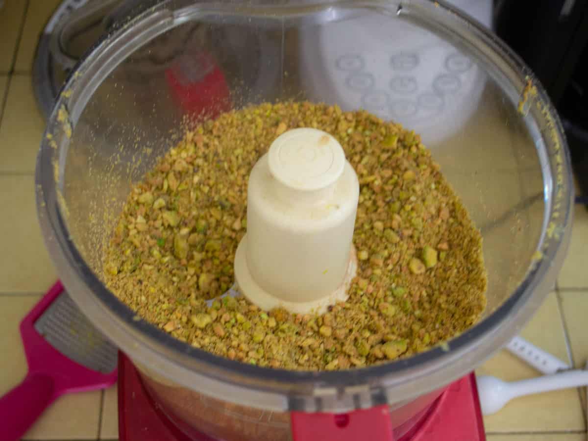 Chop the pistachios in a food processor so there are no large pieces left.