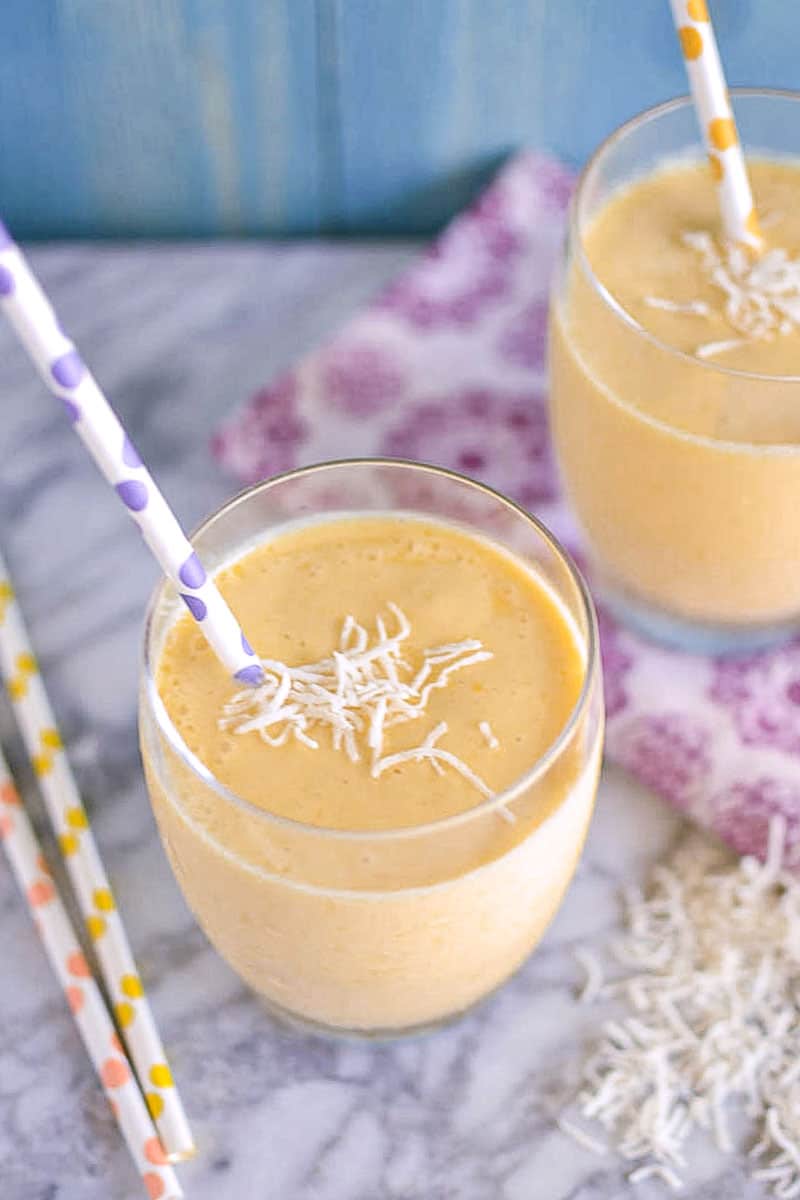 Mango lassi with rose water and cardamom and topped with shredded coconut.