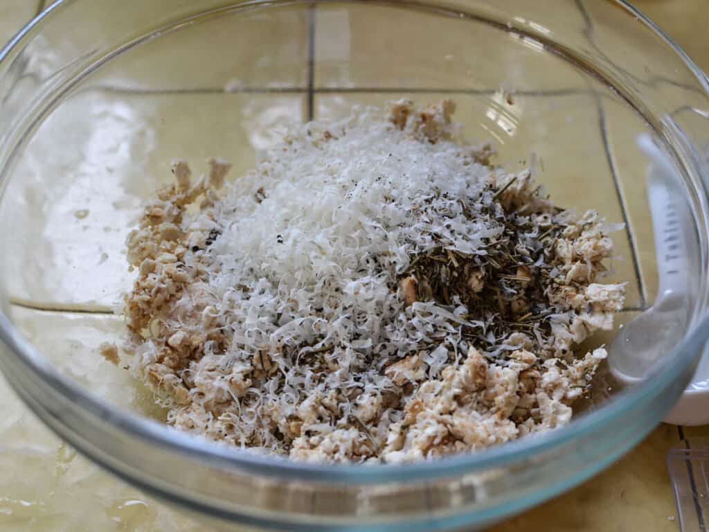 Mix the breadcrumbs with grated Parmesan and herbs de Provence.