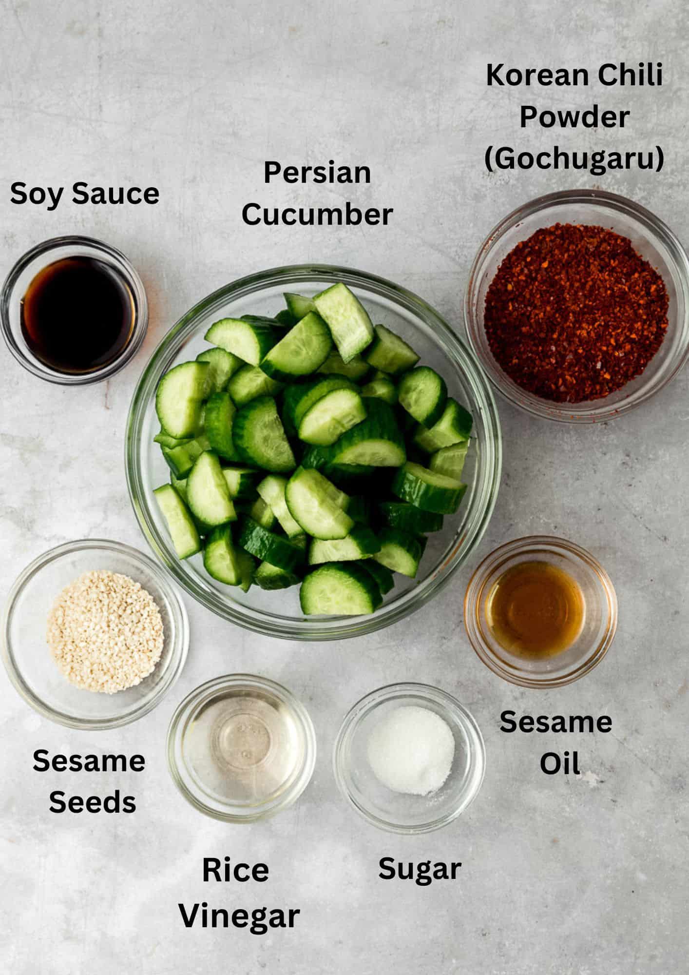 Ingredients for spicy Korean cucumber salad, including Korean red pepper, soy sauce and sesame oil.
