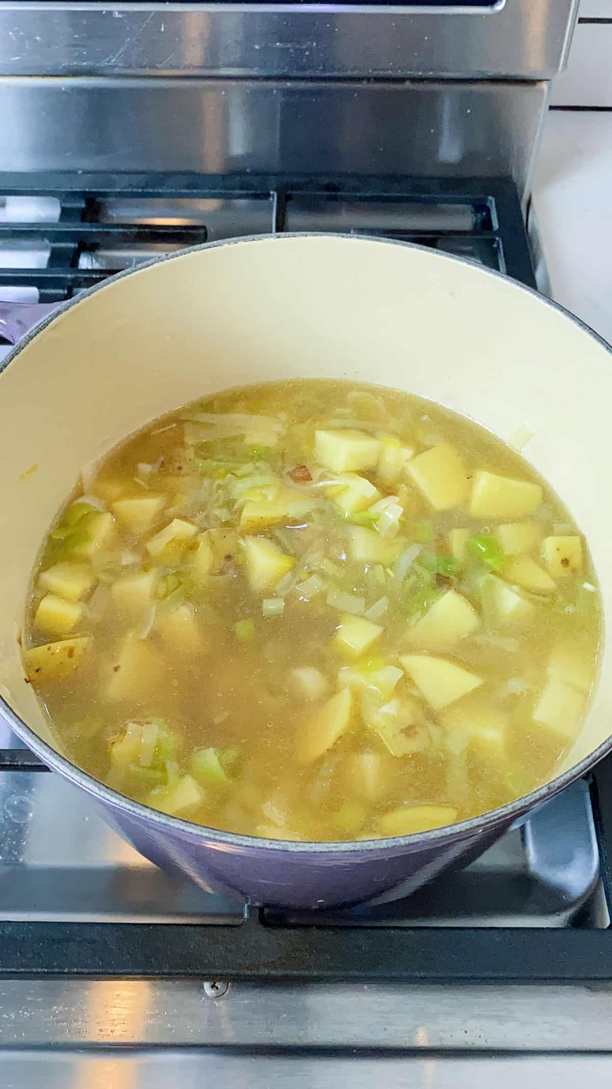 Add enough vegetable stock to cover all of the potatoes and leeks.