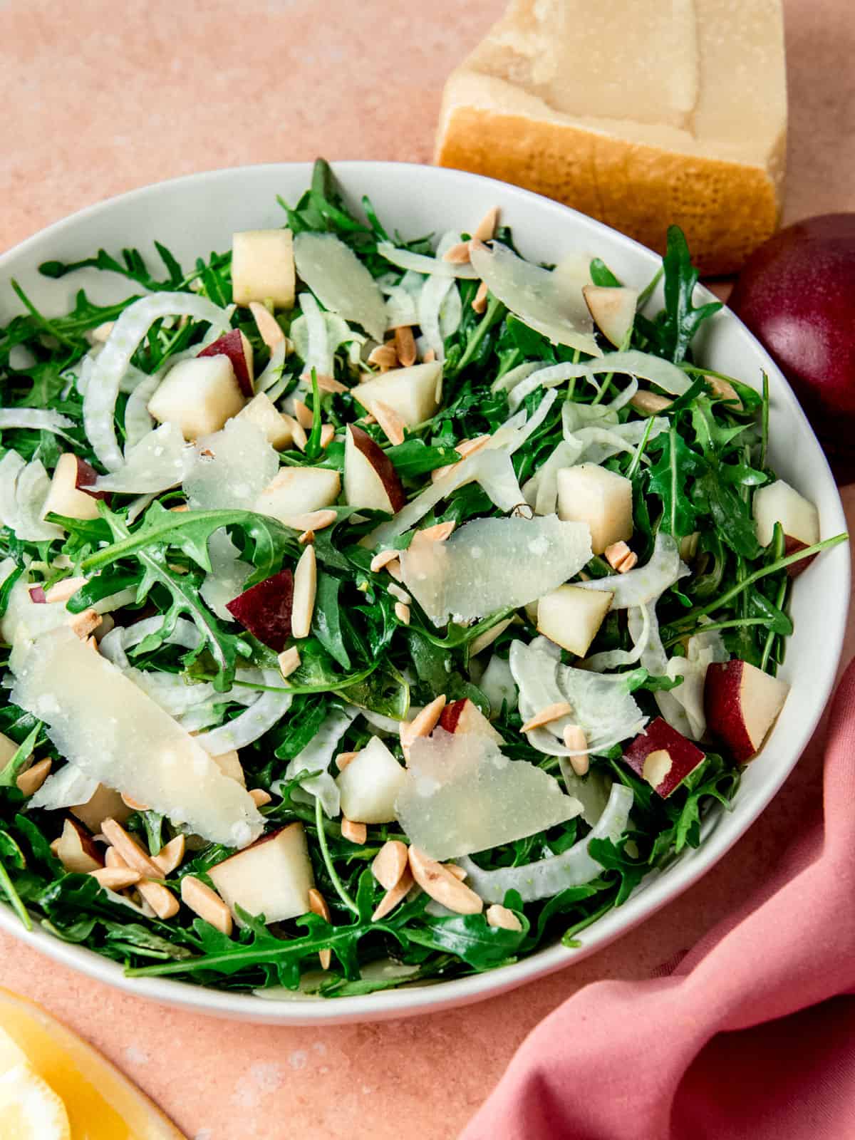 Arugula and fennel salad with shaved fennel, toasted almonds tossed with a parmesan vinaigrette.
