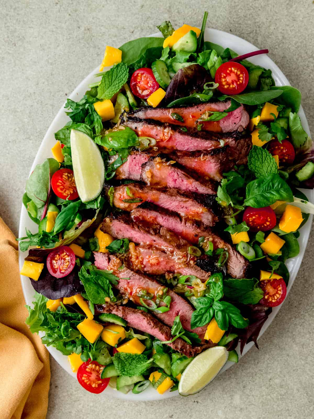 Thai beef salad with mango and chili lime dressing.